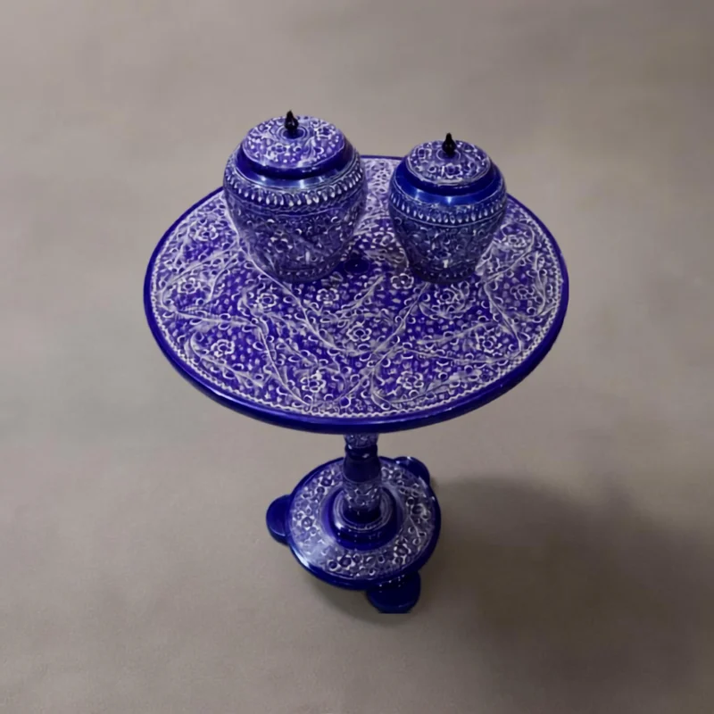 Blue naqshi pedestal table set with two matching lidded jars on top