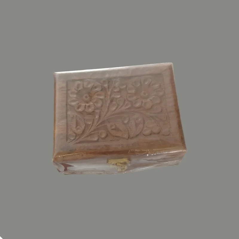 Hand-carved sheesham box with a floral pattern cut across the whole lid