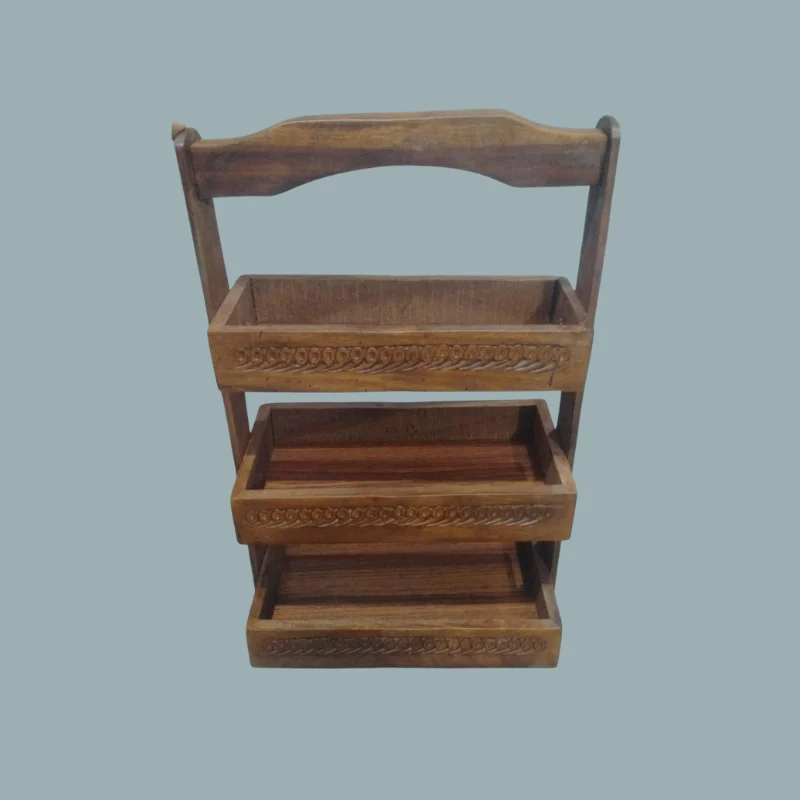 Three-tier sheesham cutlery caddy with carved trays and a turned carrying handle