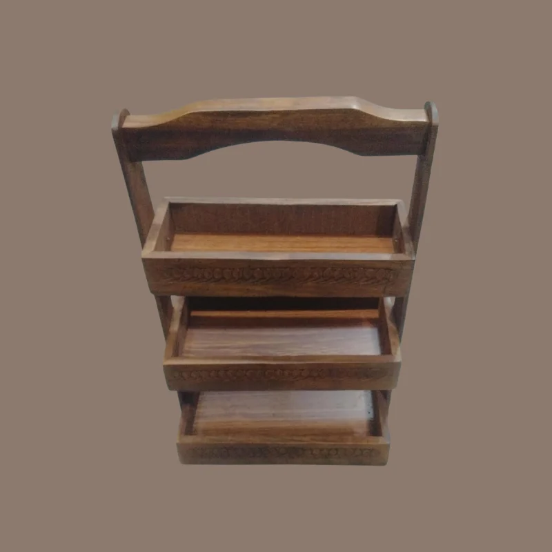 Three-tier sheesham cutlery caddy with carved trays and a turned carrying handle