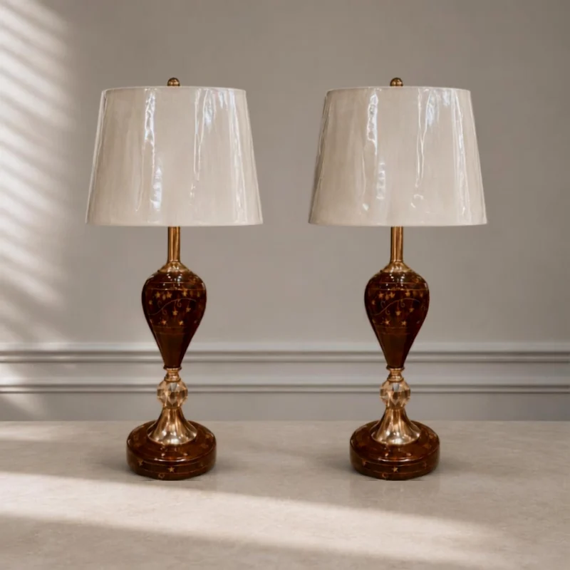 Tall lacquered lamp body with a star pattern raised on a slim metal stem