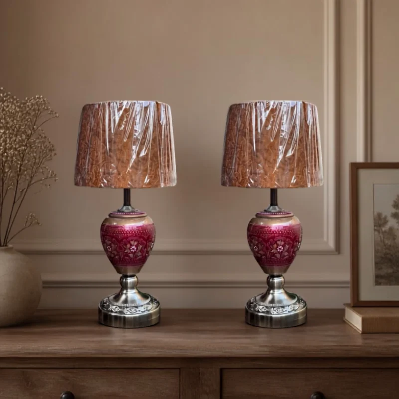 Lacquered wooden table lamp with a patterned body and a fabric shade