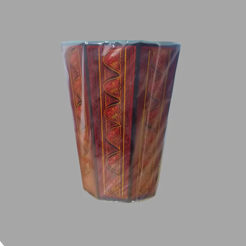 Traditional Pakistani handcrafted wooden waste bin decorated with intricate Sillanwali Naqshi lacquer artwork, showing detailed coloured patterns across the exterior and the character of hand-finished woodcraft.