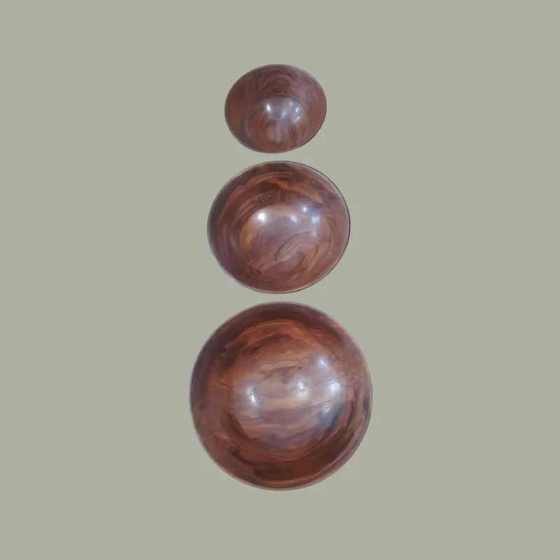 The three sheesham bowls from above, 8, 10 and 12 inch, showing the polished grain inside