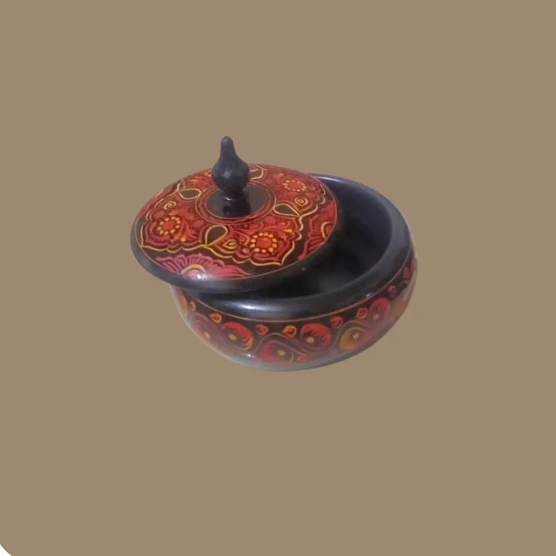 Two round naqshi powder boxes with pointed finials, one red and one black with gold