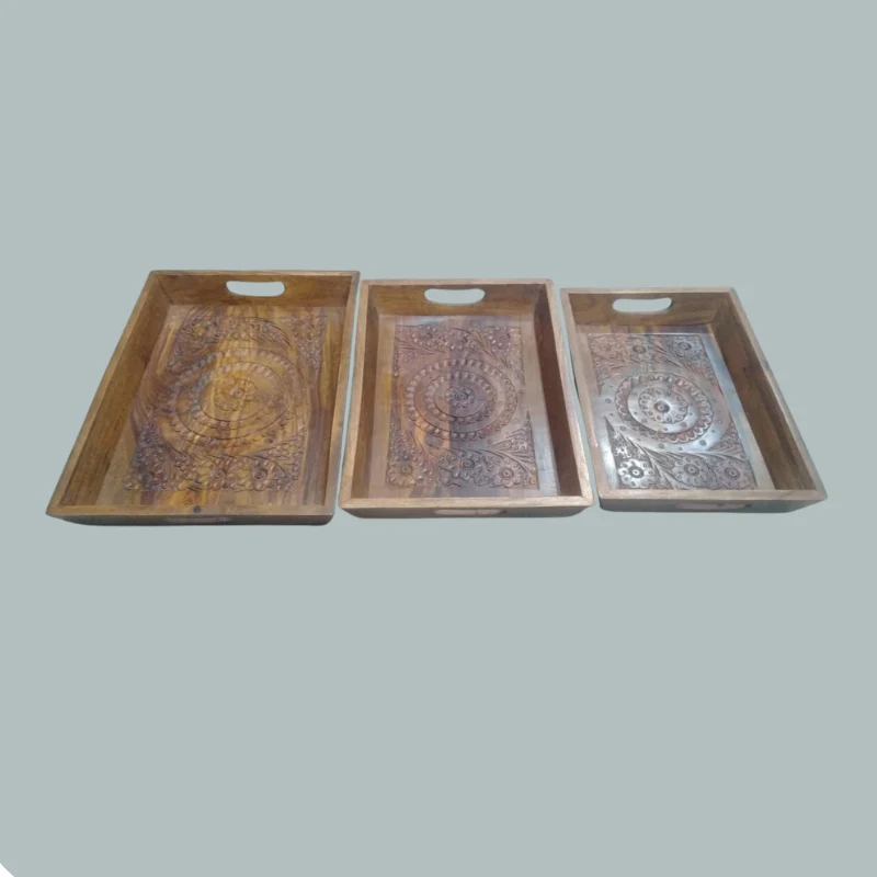 Three nesting sheesham serving trays with carved borders and cut-out handles