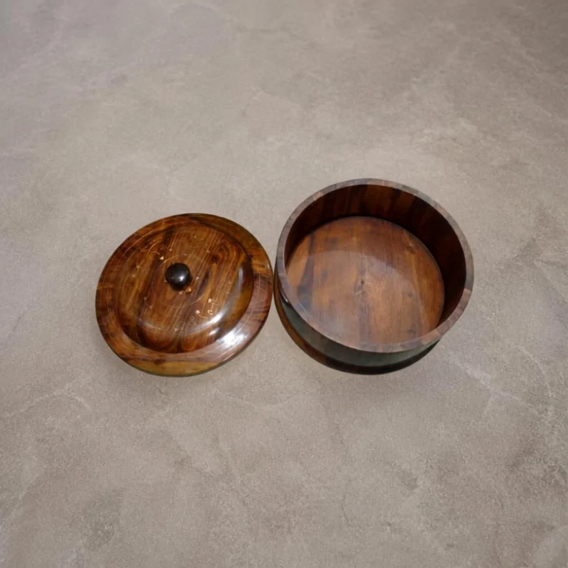 Twelve inch sheesham wooden hot pot with a lifted lid showing brass inlay scrollwork and a turned knob