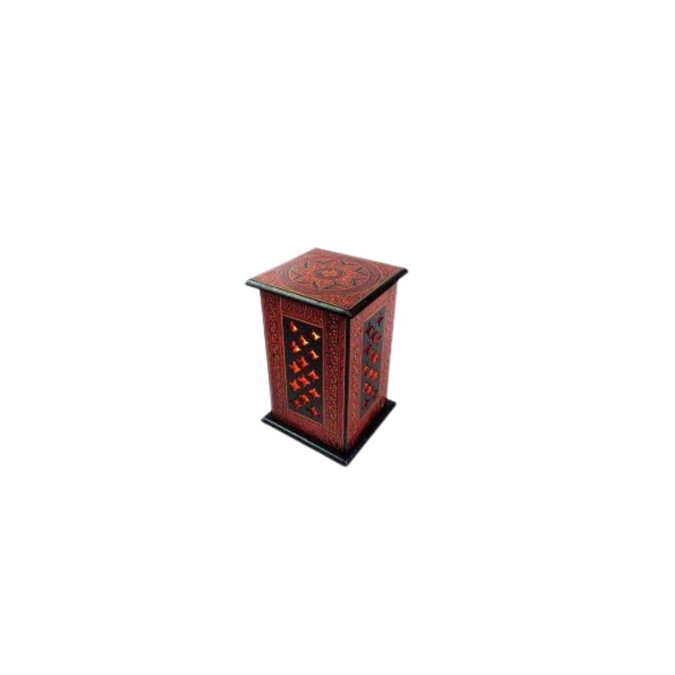 Tall red-painted wooden lantern with lattice cut-outs on all four sides