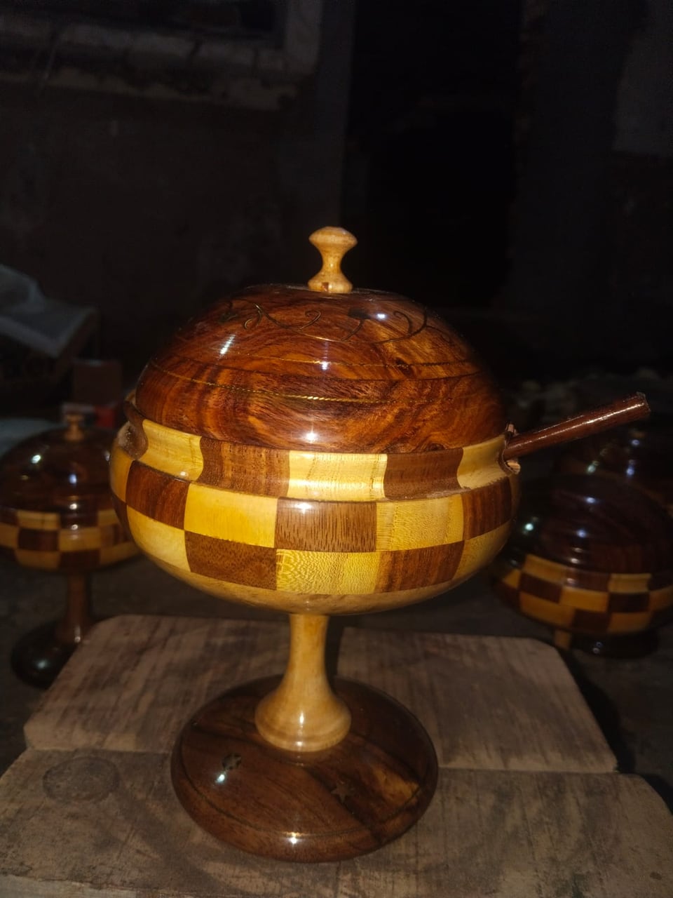 Wooden candy jar with a lid on a turned pedestal stand