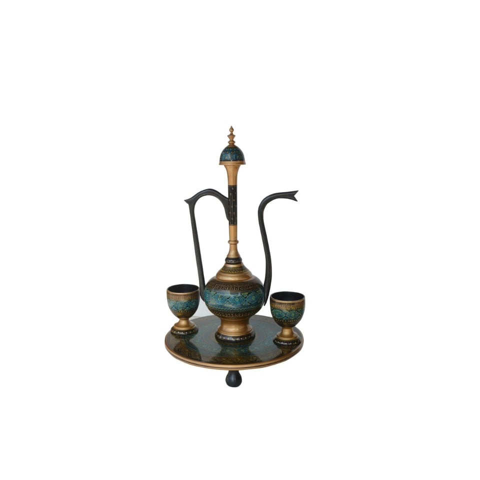 Tall turned wooden surahi with brass inlay and two cups on a round wooden tray