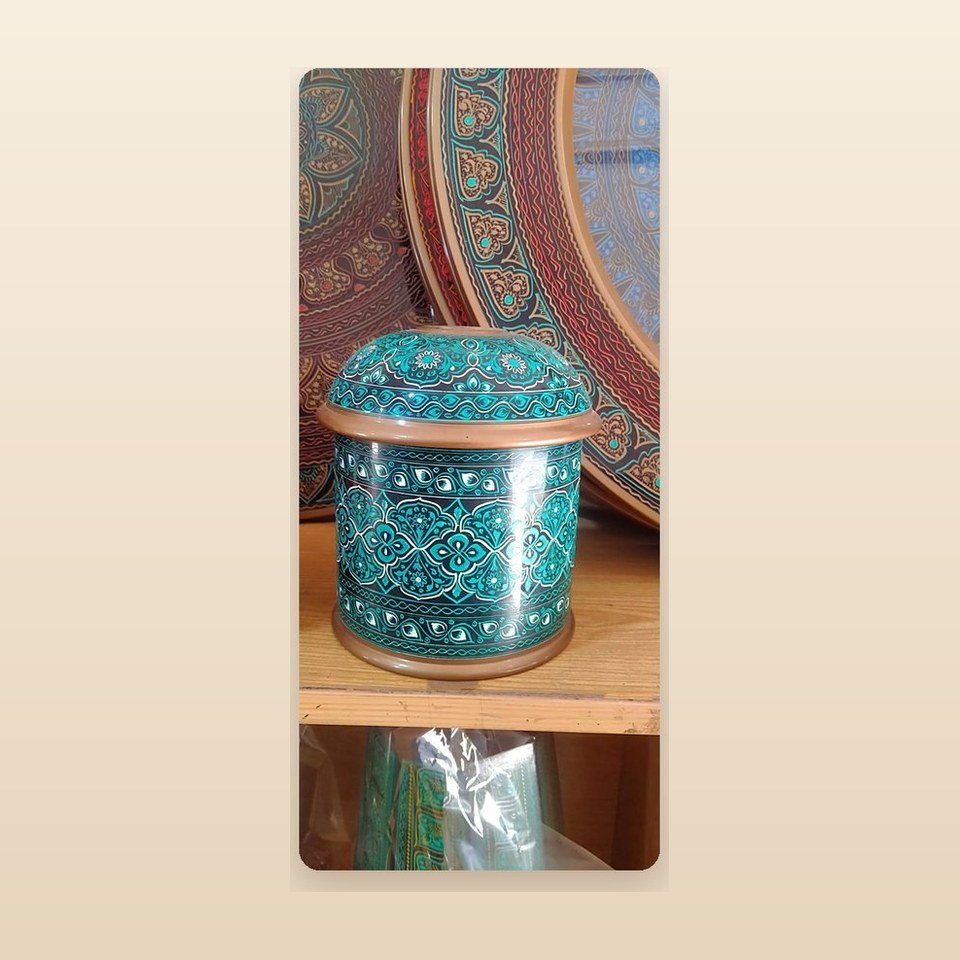 Round teal lacquered box with dense naqshi bands and a patterned lid