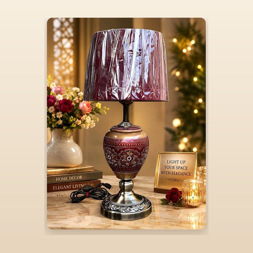 Lacquered wooden table lamp with a patterned body and a fabric shade
