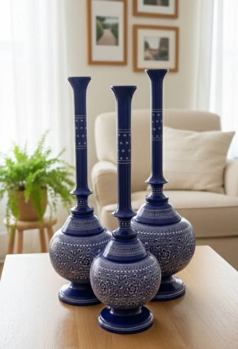 Hand-painted naqshi flower vases in blue and white patterns