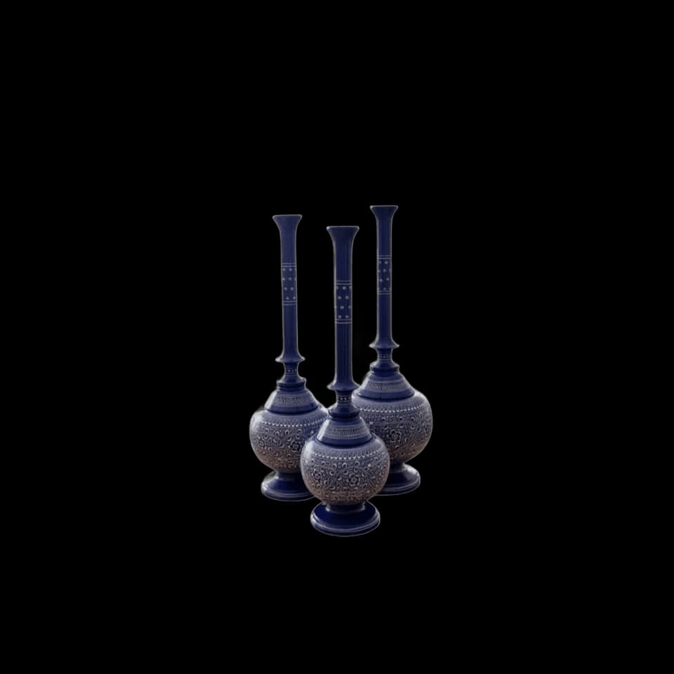 Set of three tall wooden vases hand-painted deep blue with long narrow necks
