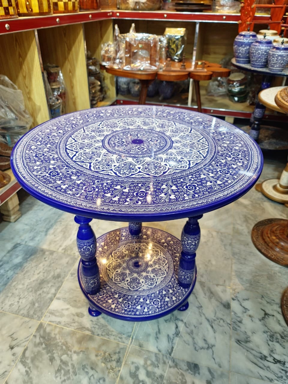 Round side table hand-painted in blue and white naqshi patterns