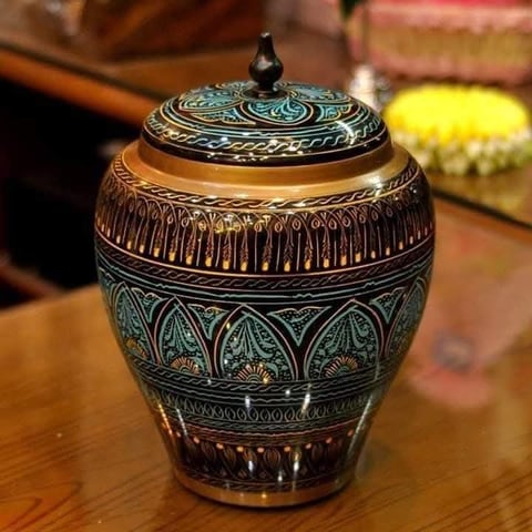 Hand-painted wooden storage jar with a lid, in green and gold naqshi patterns
