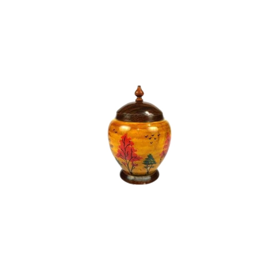 Turned wooden jar with a domed lid, hand-painted with trees on a yellow ground