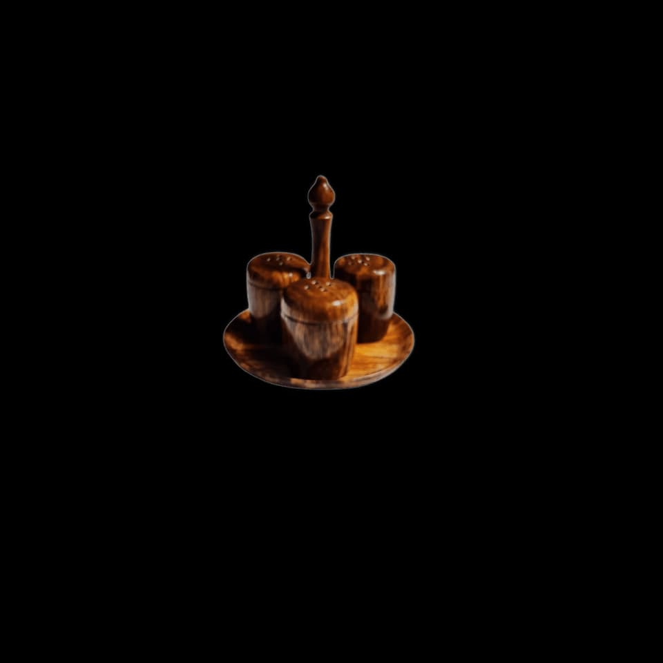Two sheesham salt and pepper shakers on a round wooden tray with a centre holder