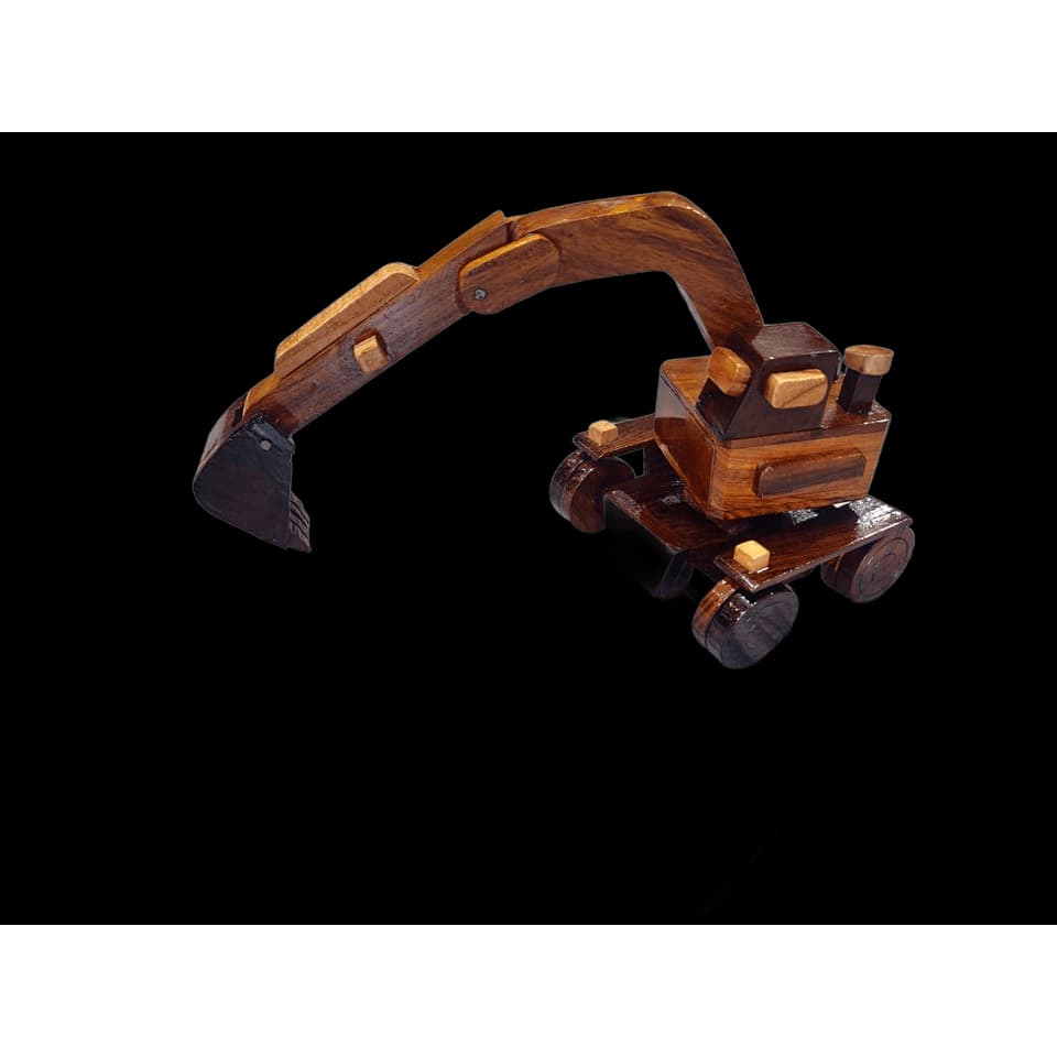Handcrafted sheesham wood excavator with a fully articulated arm and bucket mounted on four wheels