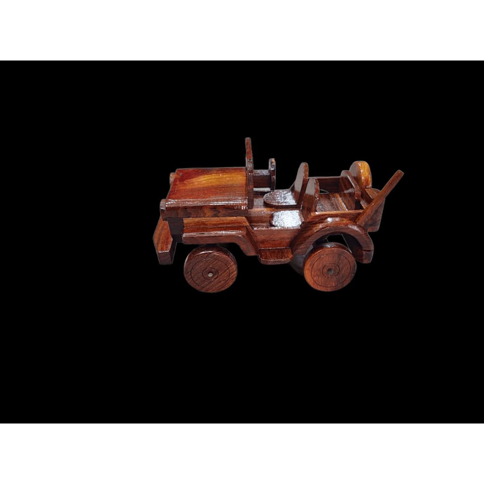 Hand-assembled sheesham wood open-top military jeep with four large wheels and a rear spare tyre