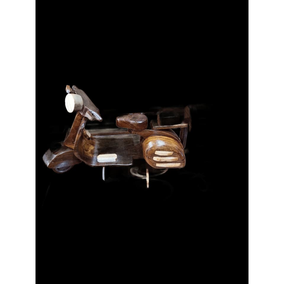 Two hand-assembled sheesham wood Vespa scooter models with curved bodywork and a round headlamp